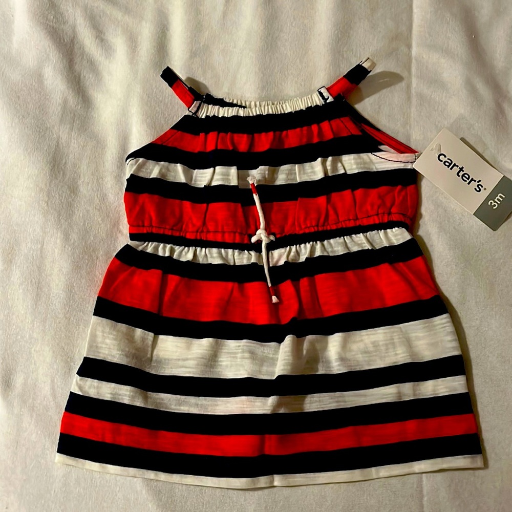 Im selling a 3 month old red,blue and white sundress from carter’s.